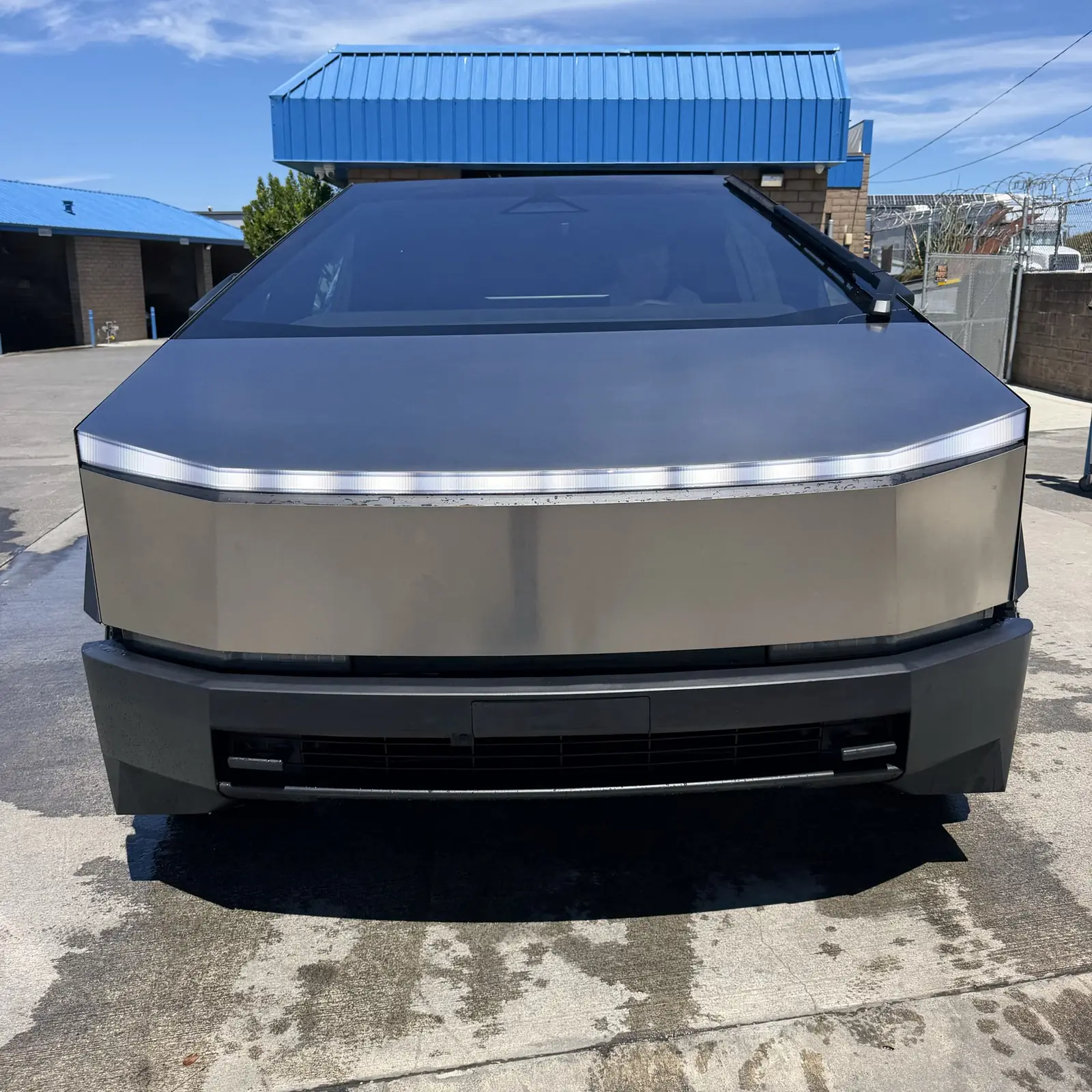 A Tesla Cybertruck, washed and dried, on the Zenith Car Wash lot